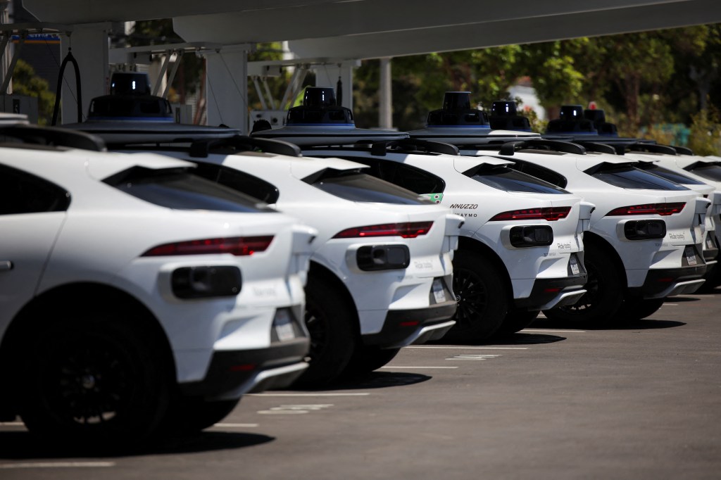 Waymo Auto-Conduction of cars that are loaded at a charging station.